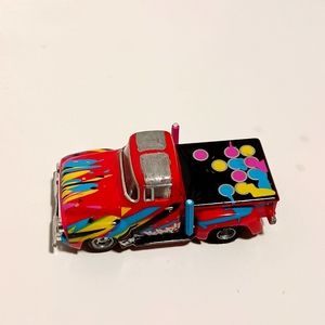 1954 Ford collectible (red graffiti)